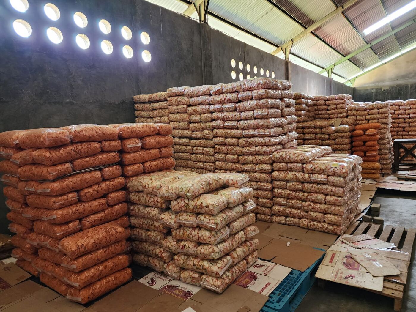 Rows of packaged crackers stacked and ready in the warehouse